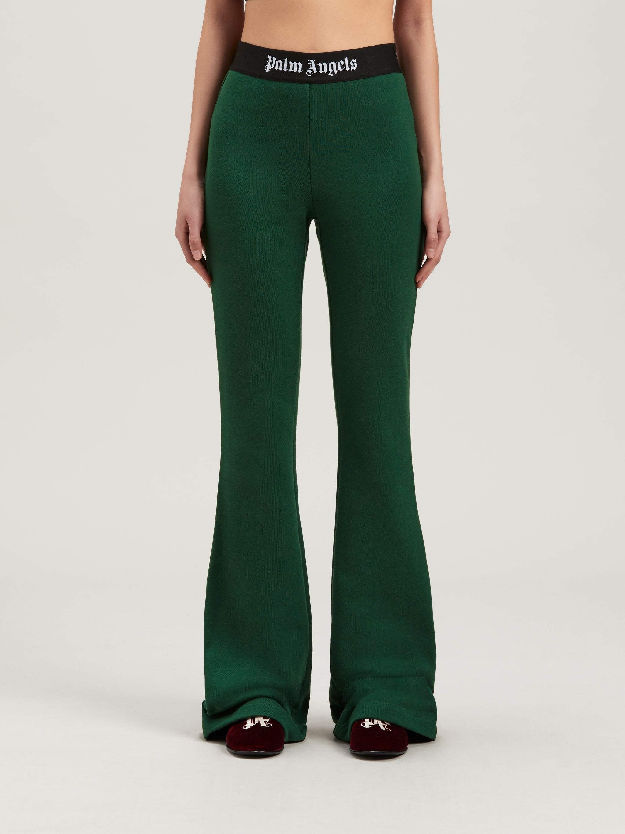 PALM ANGELS LOGO TAPE FLARE SWEATPANTS - BEYMEN