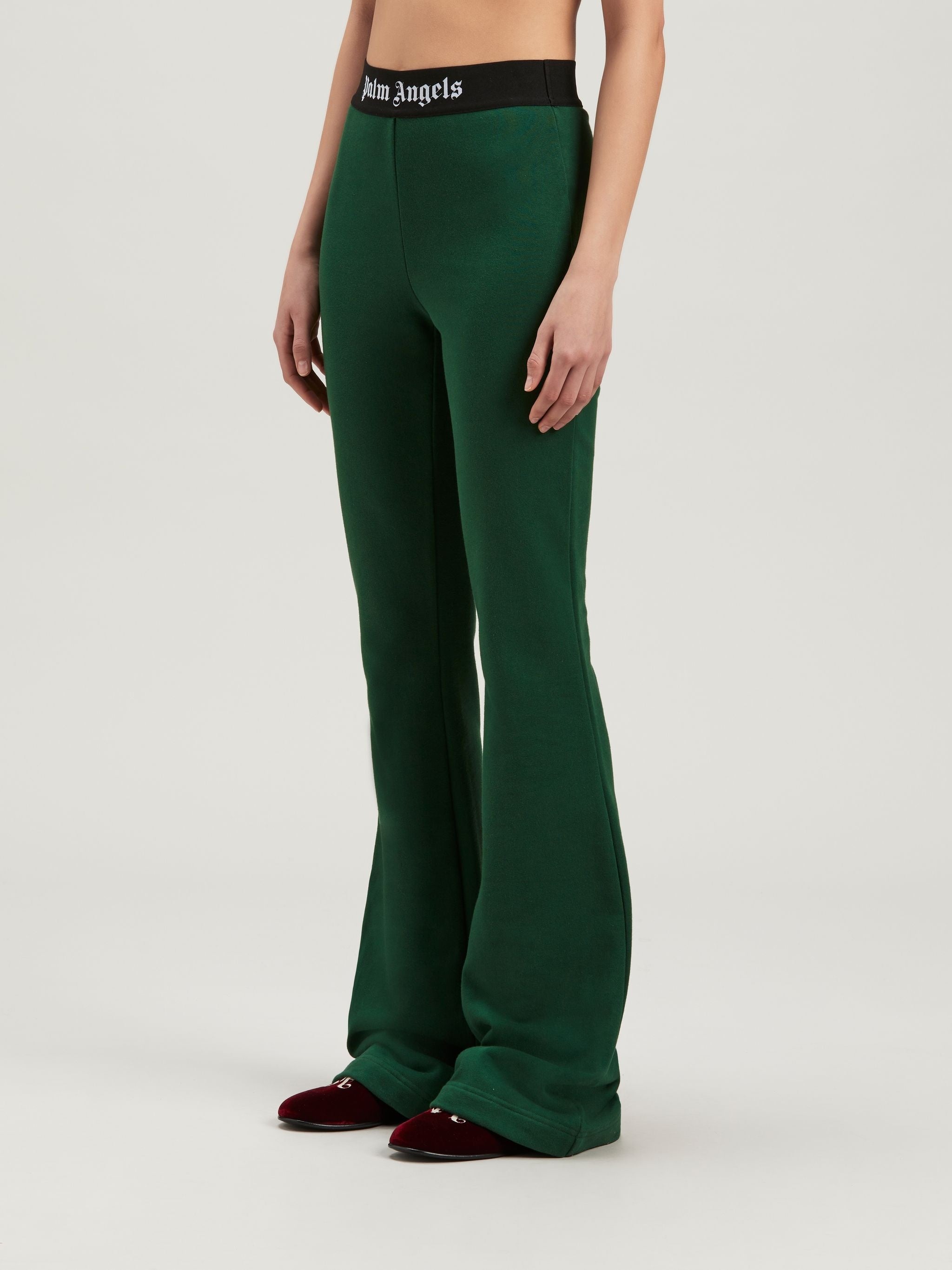 PALM ANGELS LOGO TAPE FLARE SWEATPANTS - BEYMEN