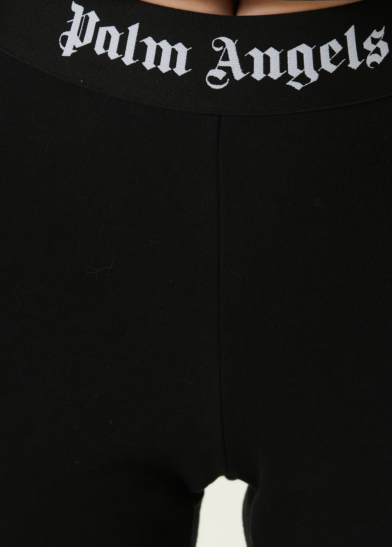PALM ANGELS LOGO TAPE FLARE SWEATPANTS - BEYMEN