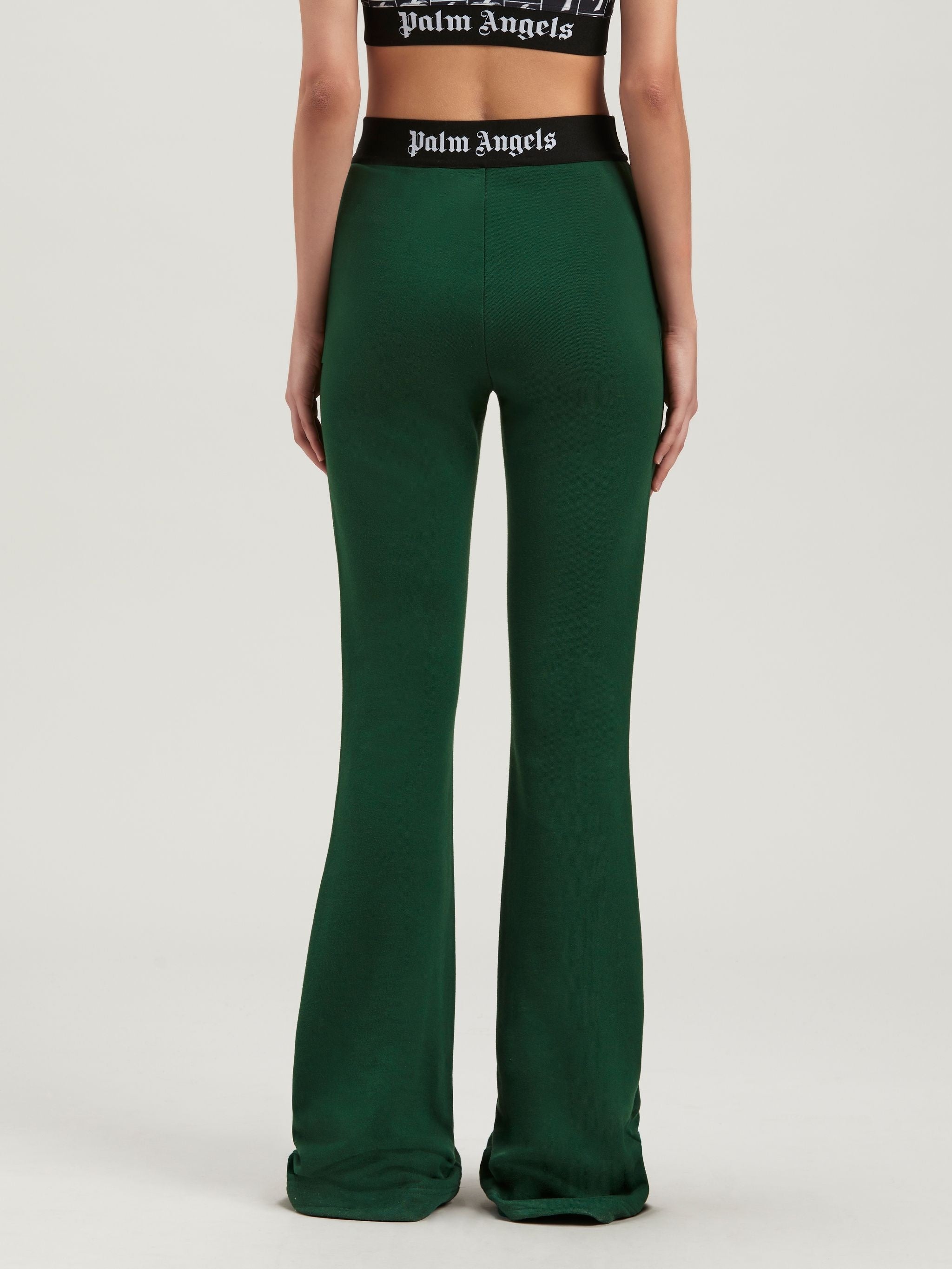 PALM ANGELS LOGO TAPE FLARE SWEATPANTS - BEYMEN